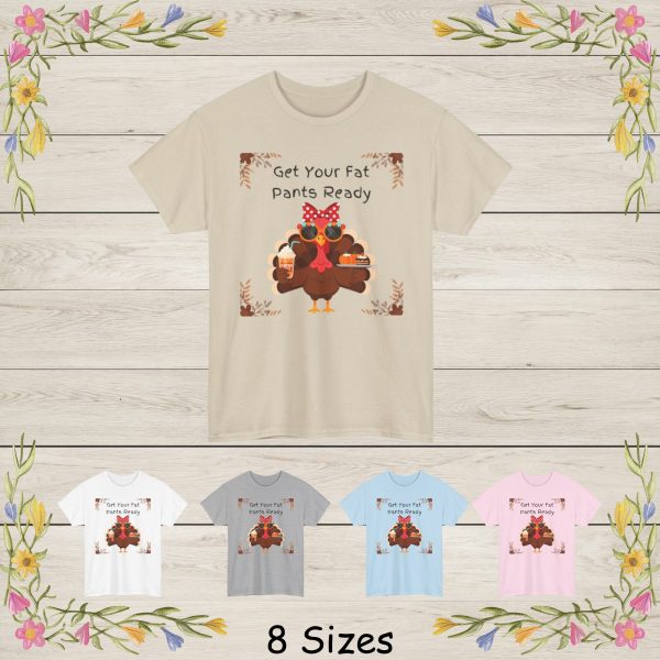 It reads: Get Your Fat Pants Ready This fun and festive illustration features a stylish Thanksgiving turkey dressed to impress! Wearing oversized sunglasses, a bright red polka-dot bow, and a cute floral headband, this fashionable turkey brings a playful twist to fall décor. In one wing, the turkey holds a pumpkin spice drink topped with whipped cream, and in the other, a plate filled with a mini pumpkin and a delicious slice of autumn dessert. The design is framed with rustic fall leaves in each corner, giving it a warm seasonal touch.
