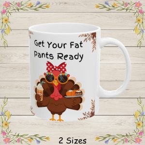 It reads: Get Your Fat Pants Ready This fun and festive illustration features a stylish Thanksgiving turkey dressed to impress! Wearing oversized sunglasses, a bright red polka-dot bow, and a cute floral headband, this fashionable turkey brings a playful twist to fall décor. In one wing, the turkey holds a pumpkin spice drink topped with whipped cream, and in the other, a plate filled with a mini pumpkin and a delicious slice of autumn dessert. The design is framed with rustic fall leaves in each corner, giving it a warm seasonal touch.