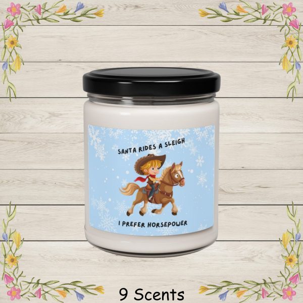 This adorable cartoon illustration reads Santa Rides A Sleigh, I Prefer Horsepower and features a cheerful young cowboy riding a galloping horse, complete with a wide-brimmed hat, red bandana, and classic western outfit.